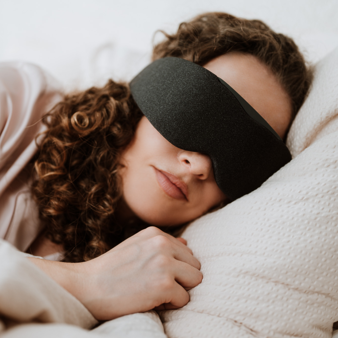 Person Sleeping Comfortably with Aura Smart Sleep Mask in Grey